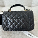 Sac à bandoulière Top Handle en cuir lisse noir - Chanel