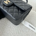 Sac à bandoulière Top Handle en cuir lisse noir - Chanel